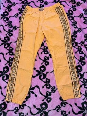 Petals and Peacock Orange Butterfly Windbreaker Pants